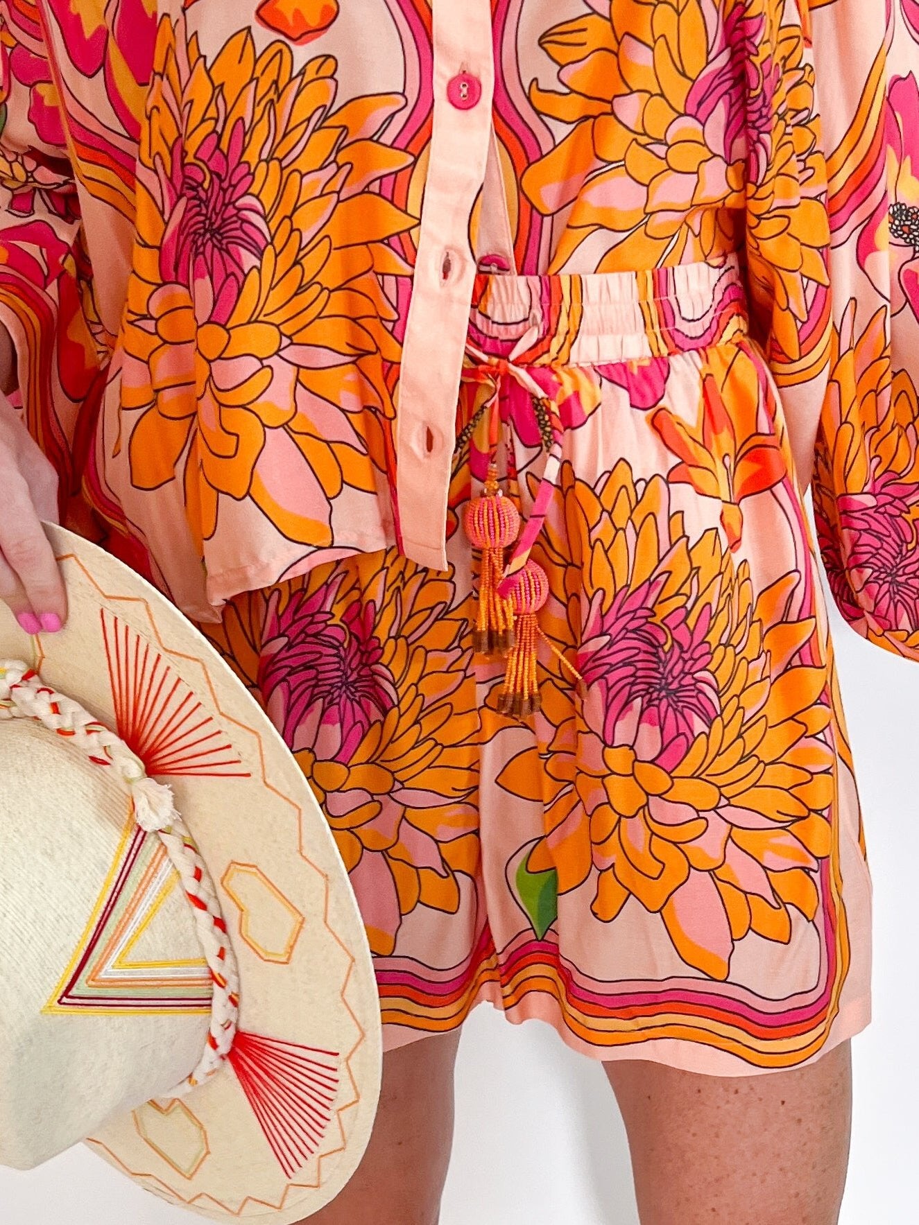 Floral drawstring shorts with tassel details