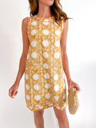 White and yellow wicker print sleeveless mini dress