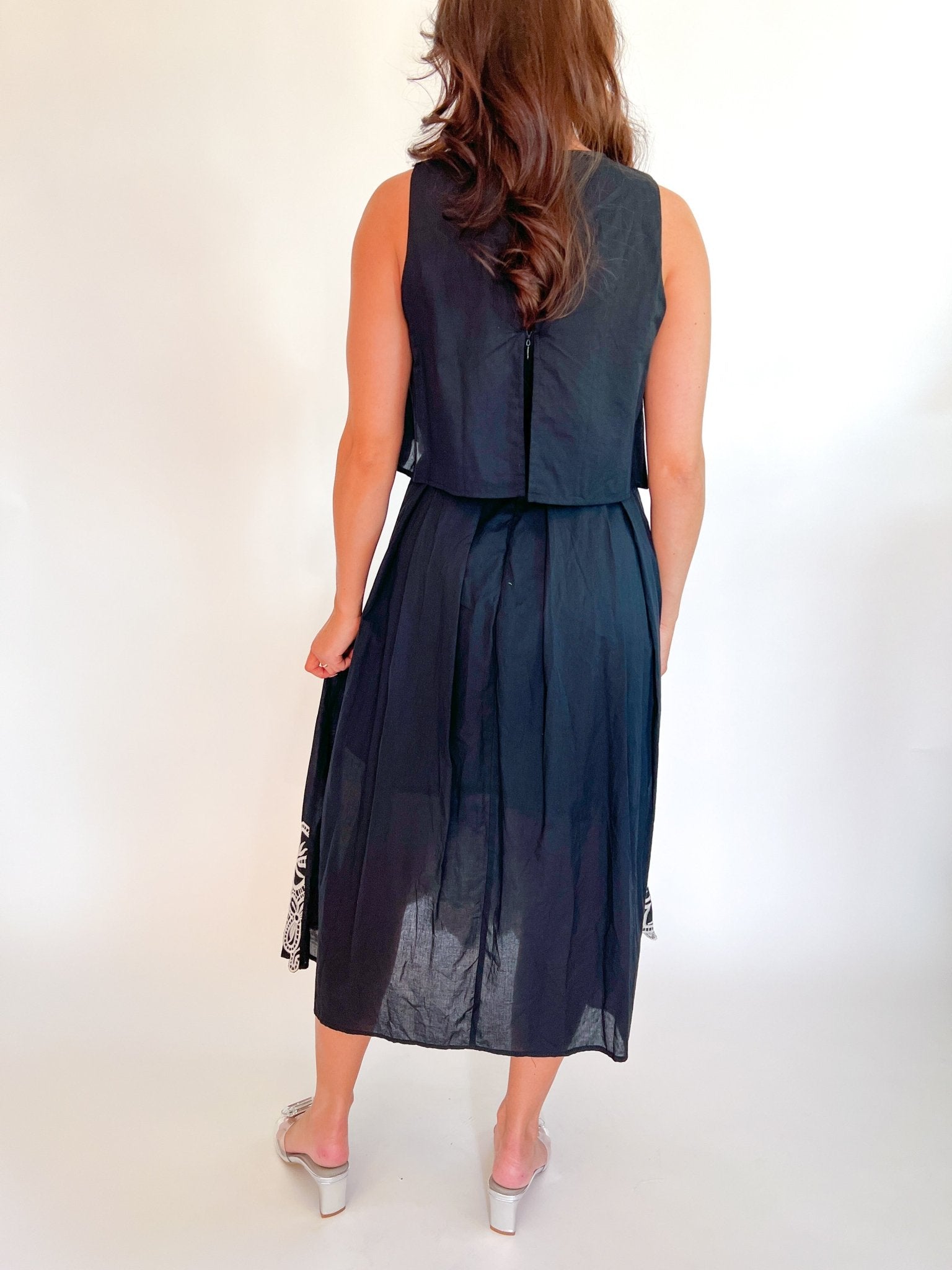 Black embroidered midi dress with A-line silhouette