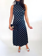 Black polka dot satin midi dress with bow neckline