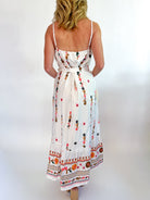 Floral embroidered midi dress with flowing silhouette