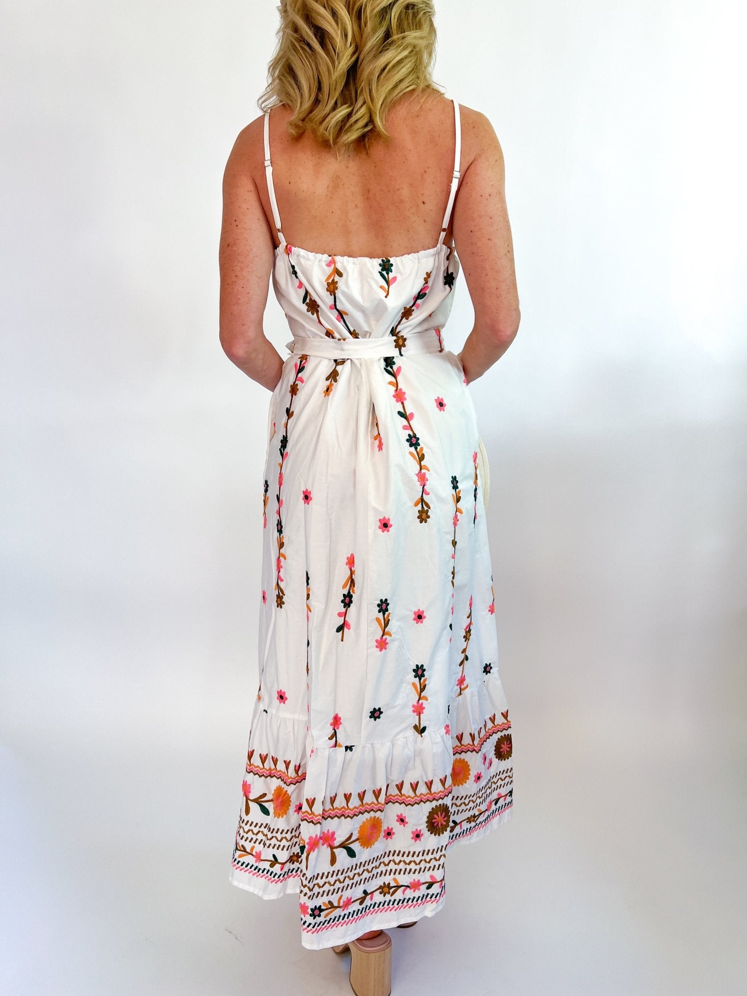 Floral embroidered midi dress with flowing silhouette