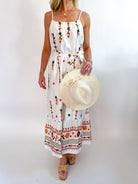 Floral embroidered midi dress with flowing silhouette
