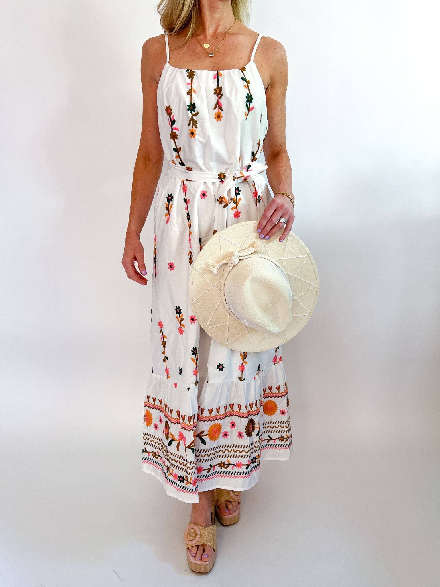Floral embroidered midi dress with flowing silhouette