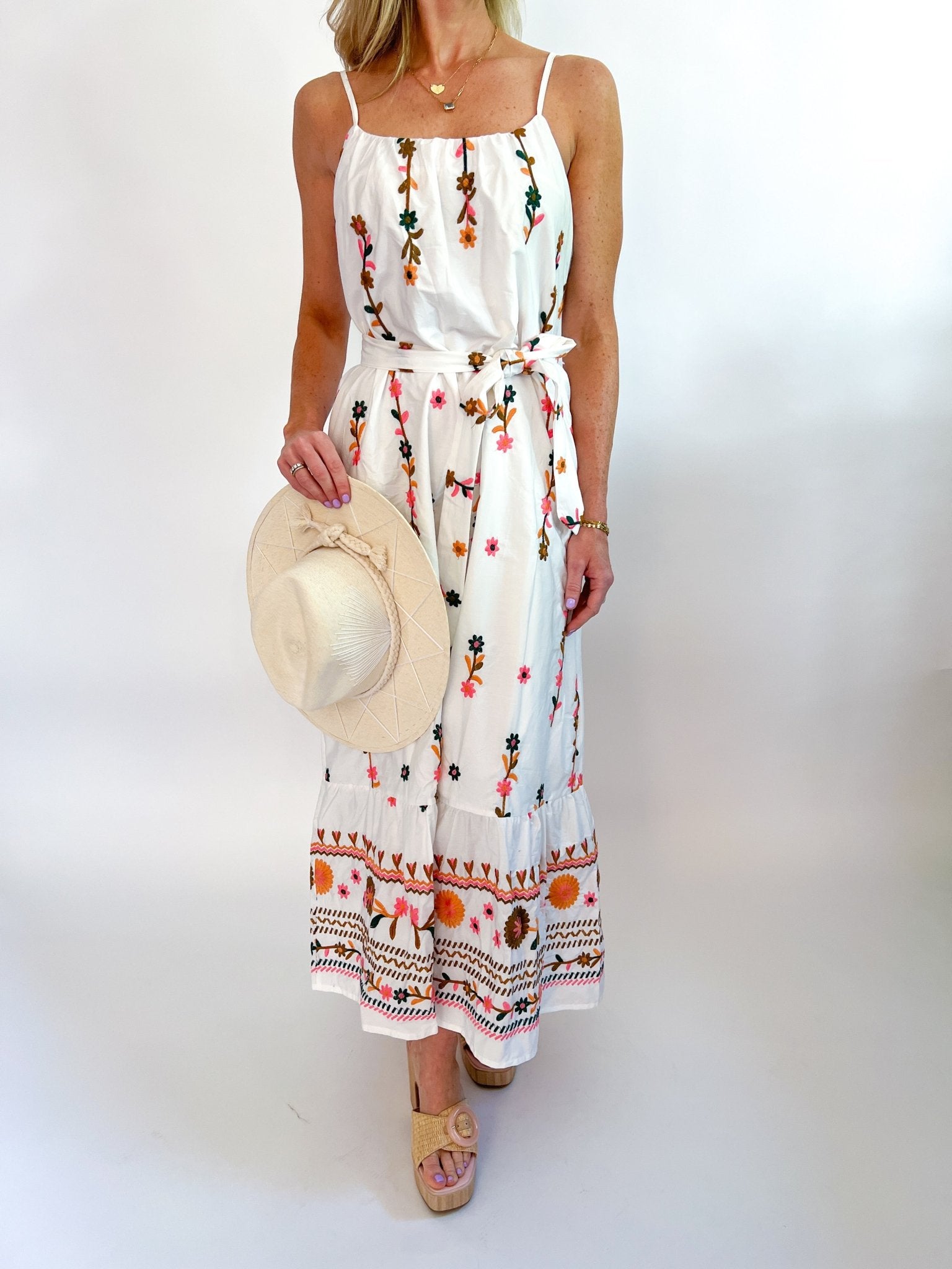 Floral embroidered midi dress with flowing silhouette