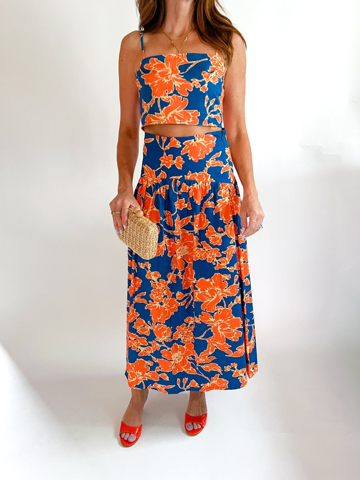 Navy and orange floral crop top with matching midi skirt