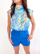 Floral Satin High Neck Tie Back Top in blue multi with polished tie back detail
