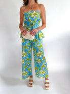 Floral strapless peplum top with wide-leg pants