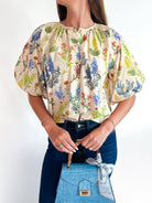 Tan floral top with chaparral print