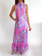 Pink sleeveless maxi gown with ruffle neckline