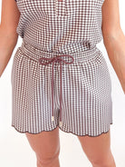 Brown gingham shorts with scalloped ruffle hem