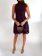 Chocolate brown mini dress with sleeveless silhouette