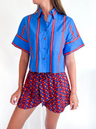 Blue striped top with ledger stripe pattern