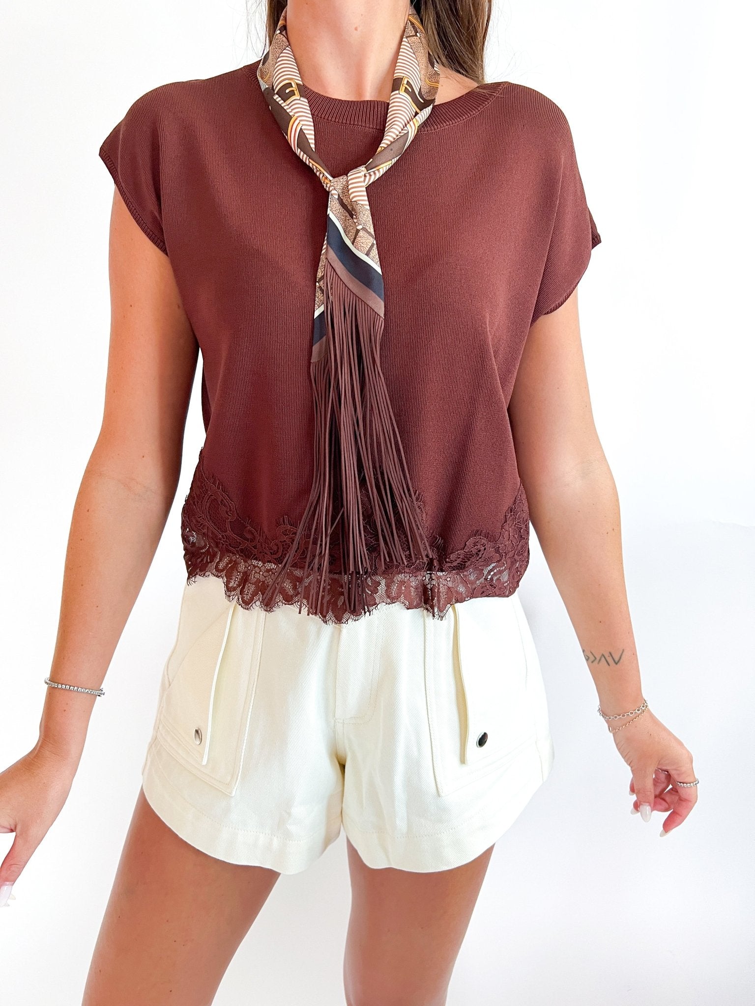 Brown knit top with lace trim hem
