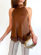 Brown sleeveless mock neck top with lace trim