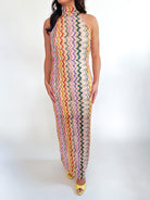 Striped halter maxi dress with body-skimming silhouette
