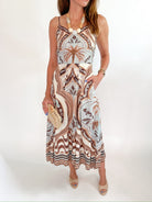 Mixed print halter maxi dress with flowing silhouette