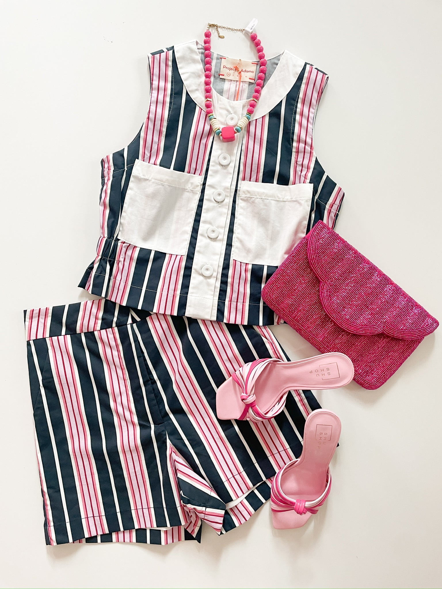 Navy and pink striped high-waisted shorts with relaxed fit