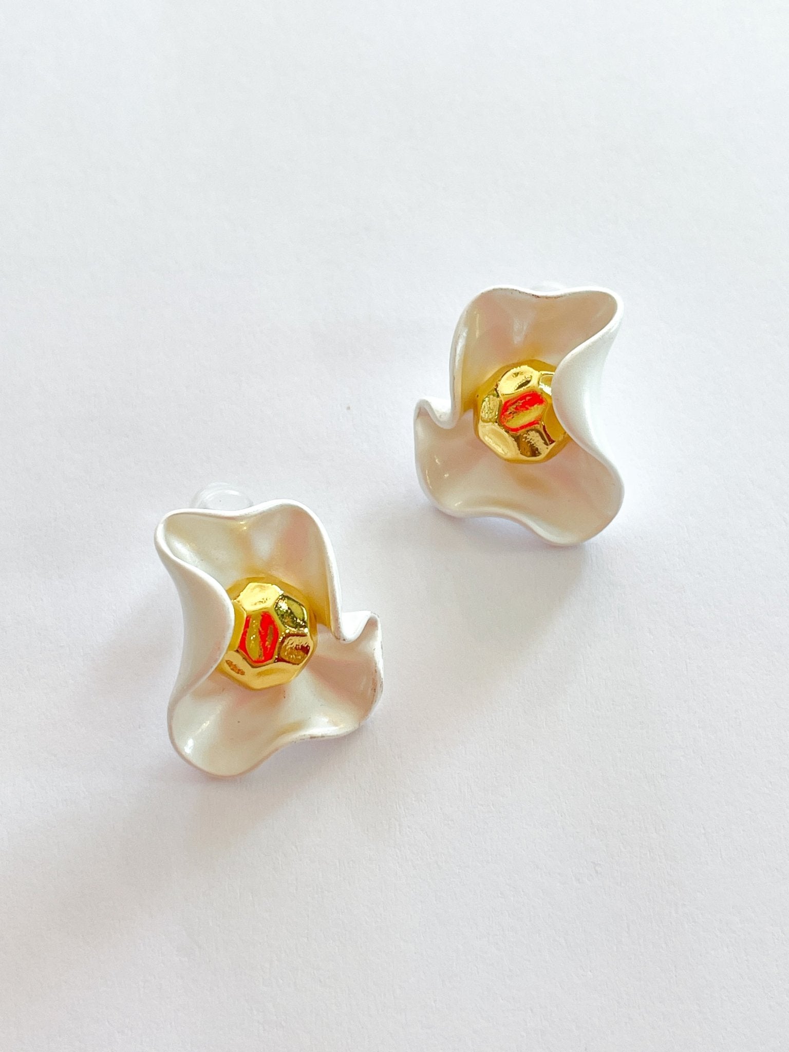 Gold floral stud earrings