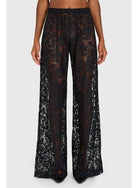 Navy lace wide-leg pants with polished flowing silhouette