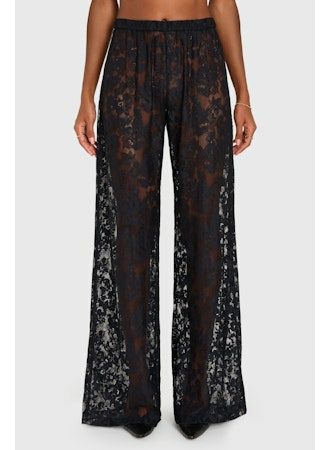 Navy lace wide-leg pants with polished flowing silhouette