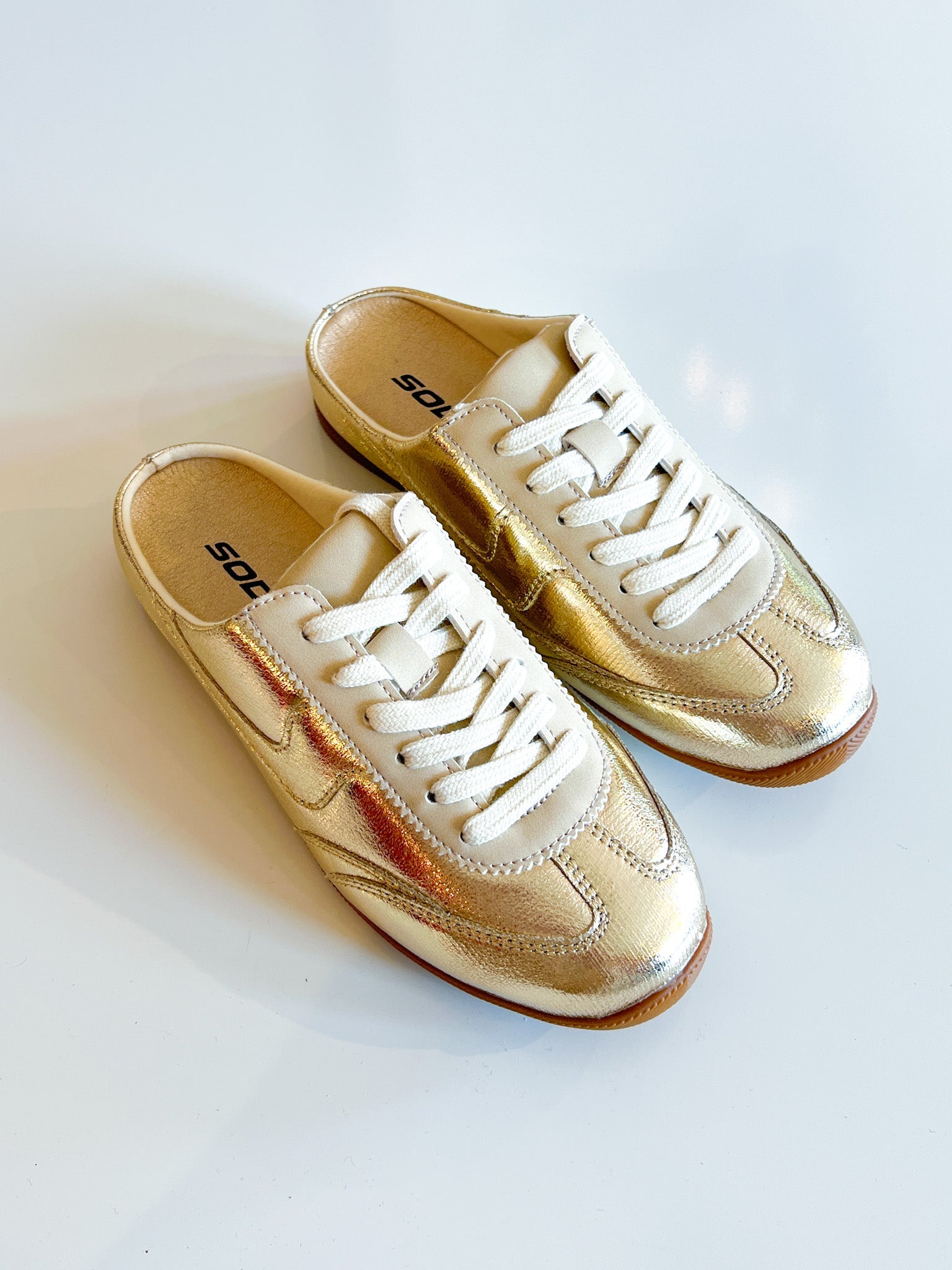 Gold metallic lace-up slide sneakers