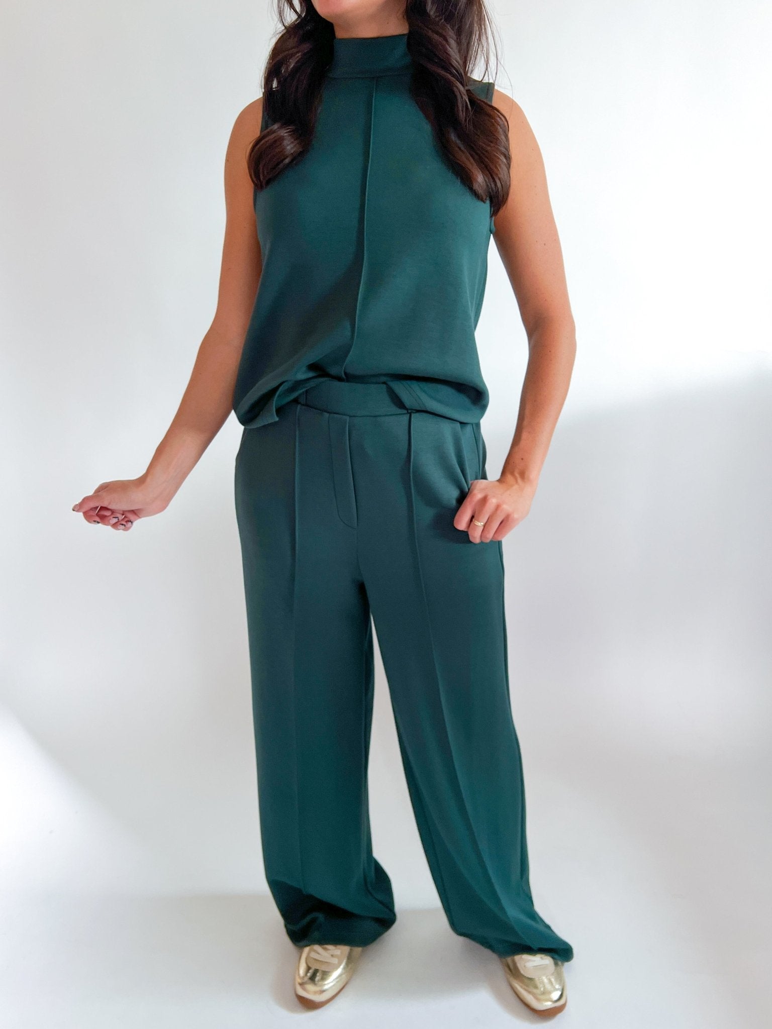 Green sleeveless mock neck top and pant set