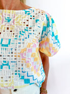 Multicolor geometric print blouse with puff sleeves