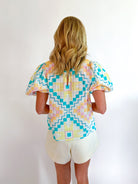 Multicolor geometric print blouse with puff sleeves
