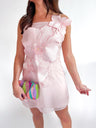 Black fitted mini dress with oversized 3D orchid applique detail from neckline to hem