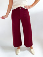 Red wide leg knit pants with patch pockets