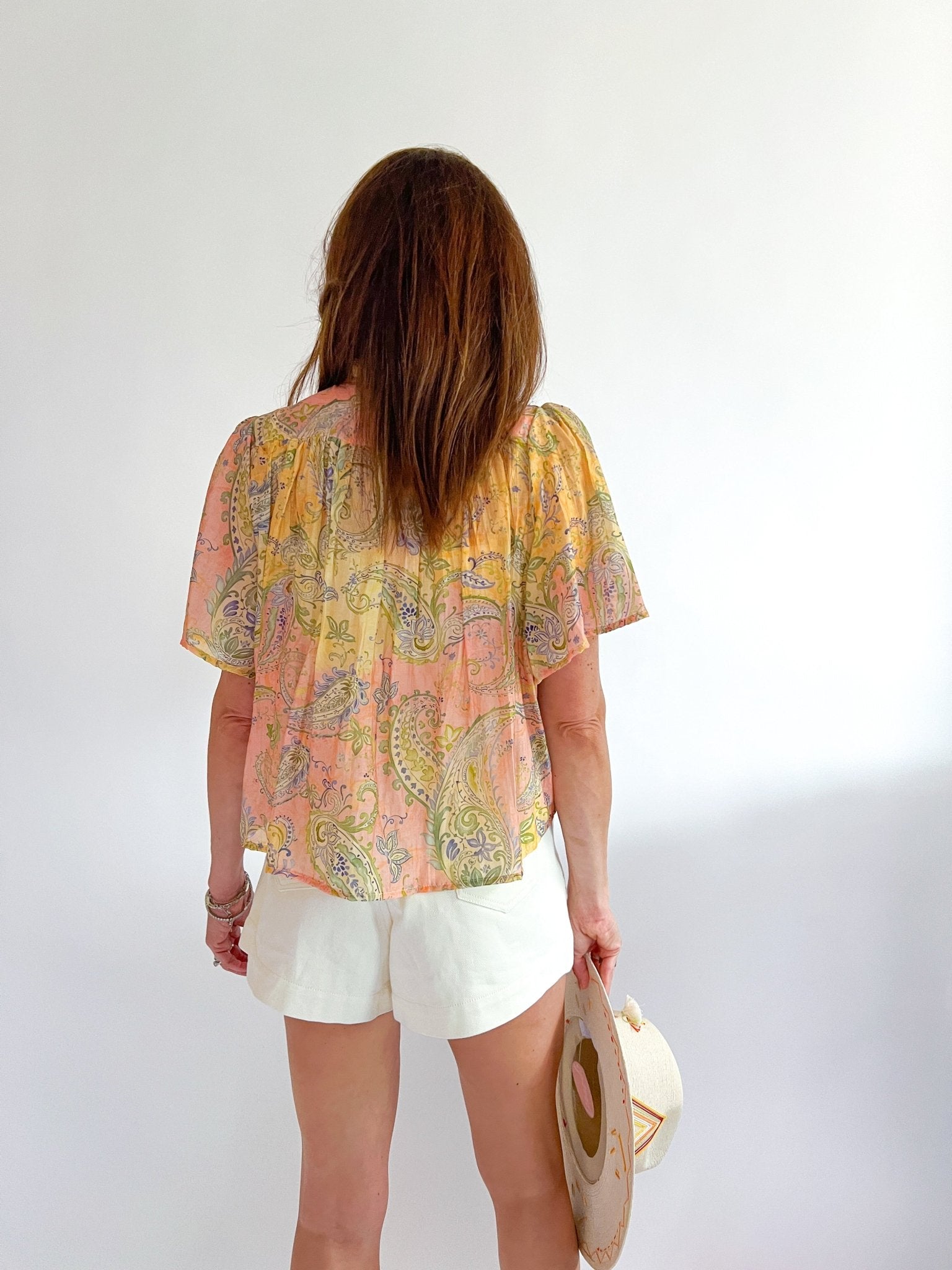 Floral short sleeve top with ruffle details