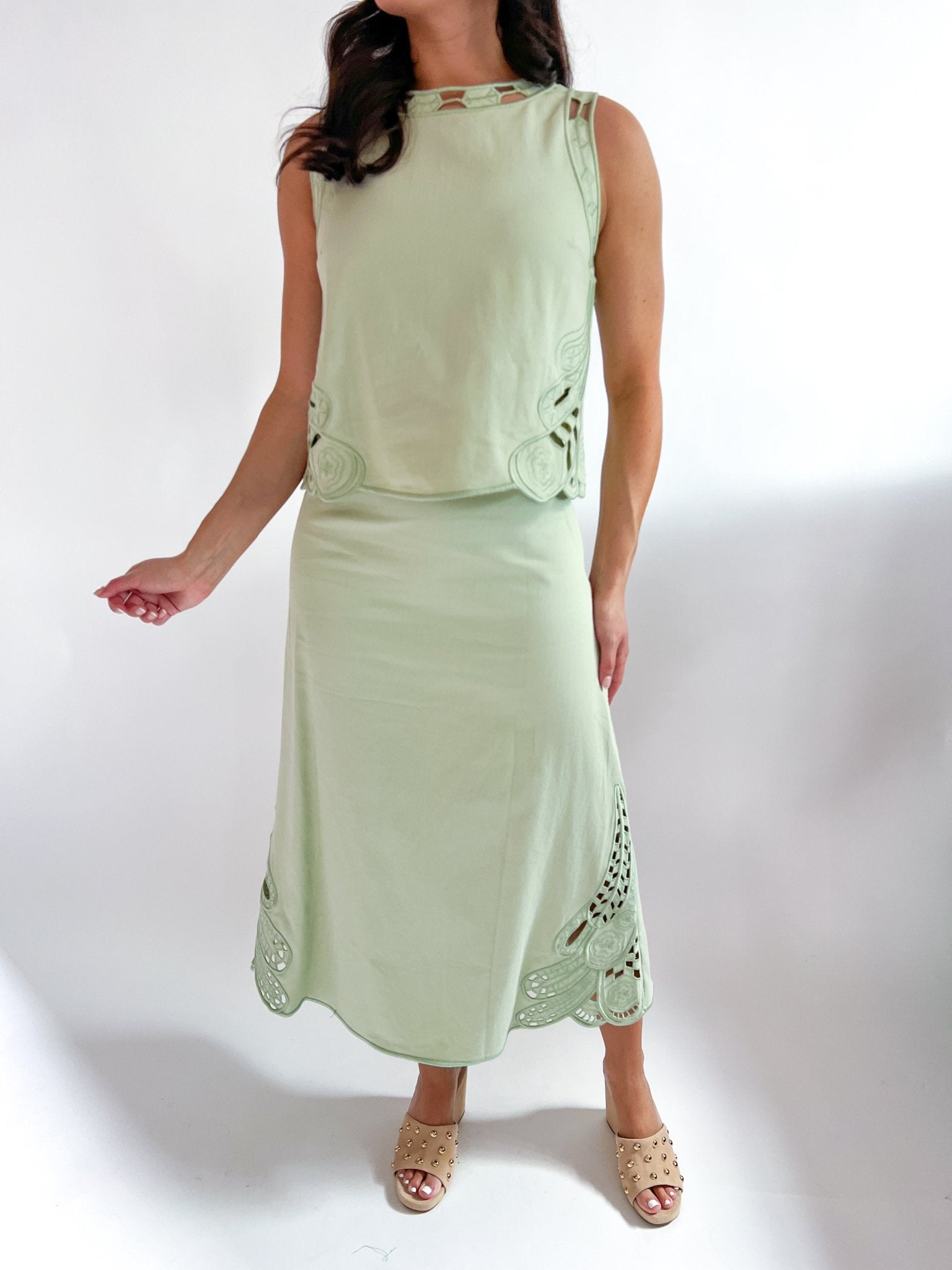 Sage green sleeveless top and midi skirt matching set