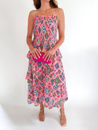 Pink multi floral pintucked midi dress with flowing silhouette and feminine detail