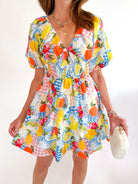 Multi color smocked V-neck short sleeve mini dress