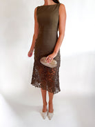 Floral sleeveless midi dress with lace hem
