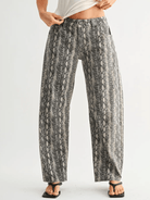 Animal print mid rise barrel jeans