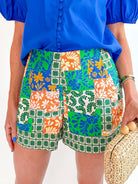 Green patchwork print shorts