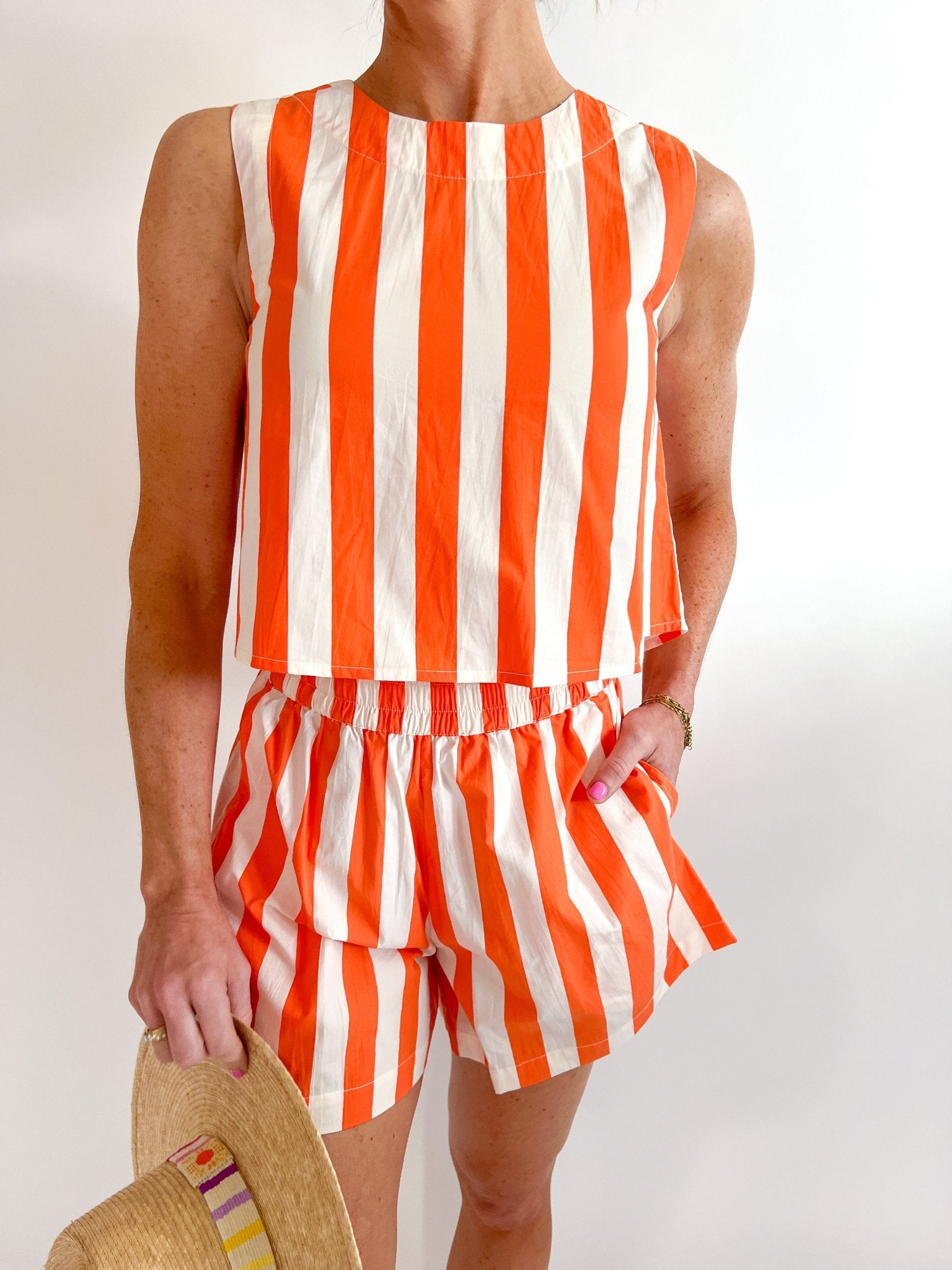 Sunny Stripes Crop Top by LIVRO in orange and white stripe sleeveless design