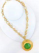 Green gemstone bezel necklace with twisted rope chain