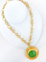 Green gemstone bezel necklace with twisted rope chain