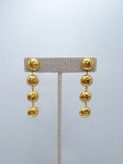 Gold textured cascade drop earrings