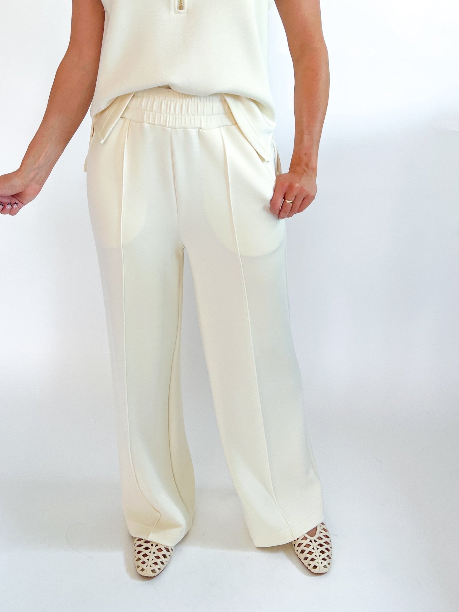 White wide leg lounge pants with pintuck detail