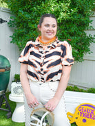Tiger print puff sleeve blouse with ruffle trim