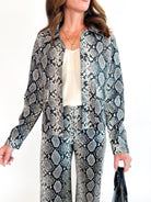 Snake print faux leather jacket with long sleeves