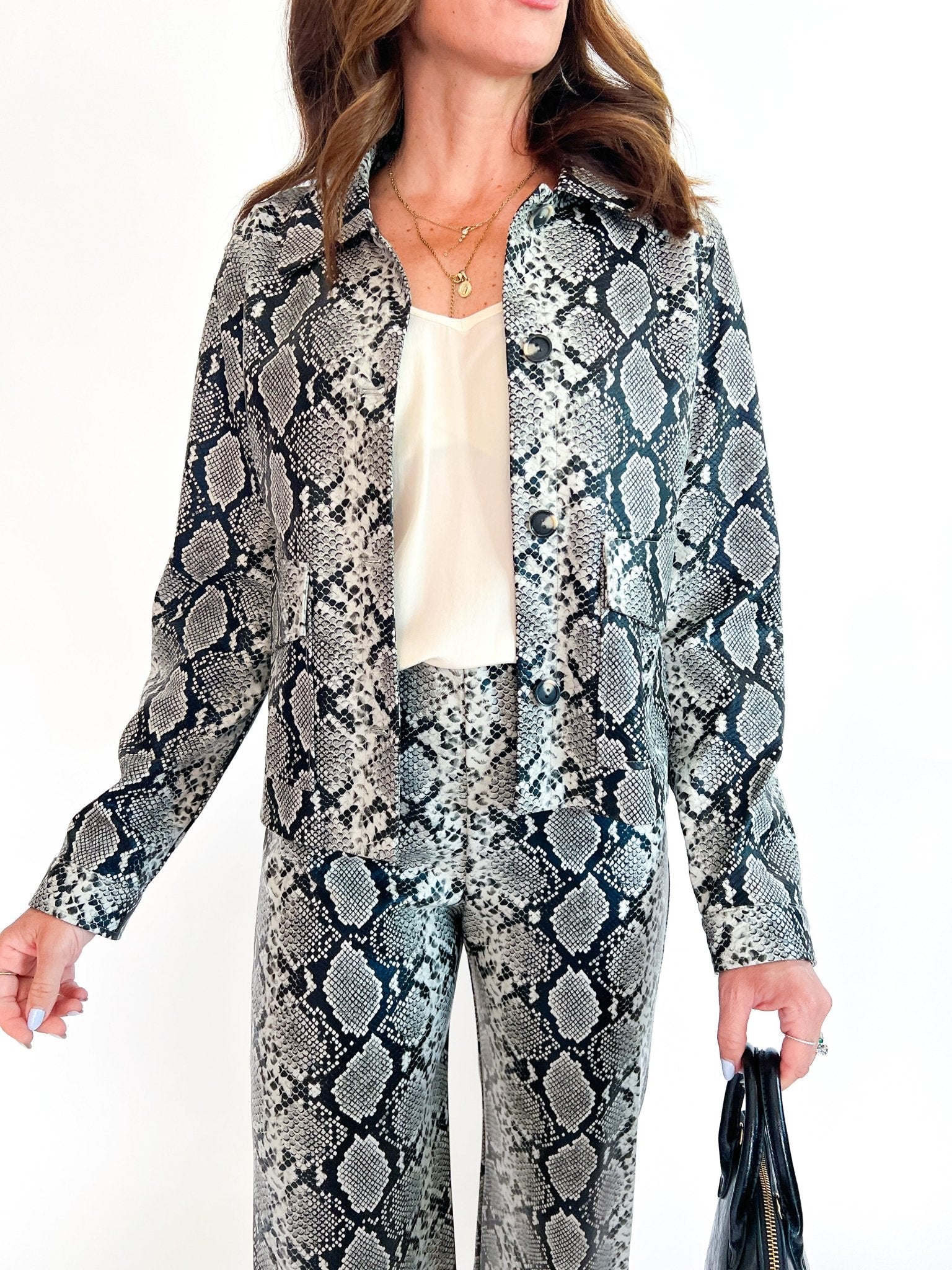 Snake print faux leather jacket with long sleeves
