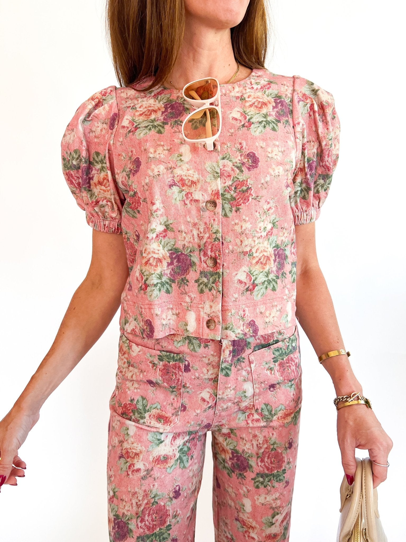 Pink floral top with short puff sleeves