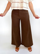 Brown wide leg jeans with front patch pockets